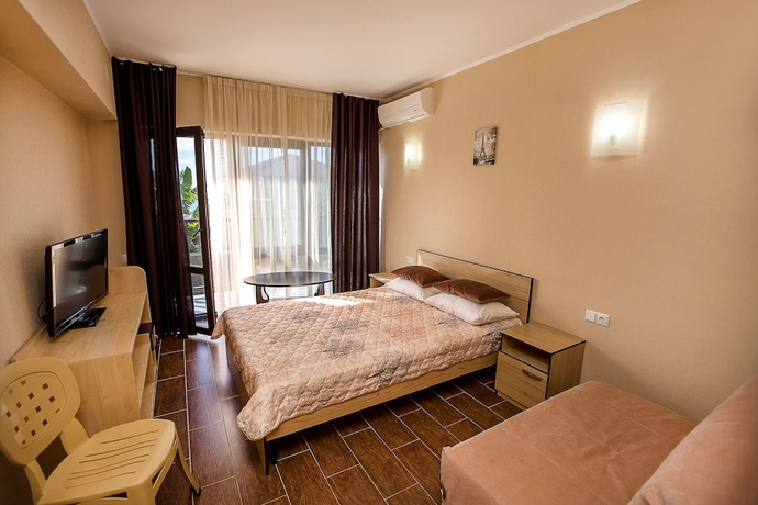 Imagen de la habitación del Hotel Regaliya. Foto 16