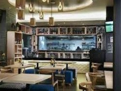 Imagen del bar/restaurante del Hotel Regantris Surabaya. Foto 7