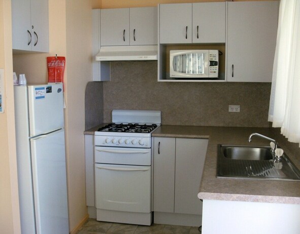 Imagen de la habitación del Hotel Regatta Point Holiday Park. Foto 20