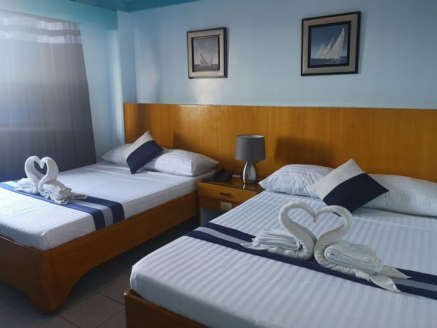 Imagen de la habitación del Hotel Regatta Residence. Foto 7