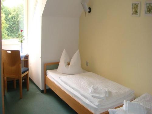 Imagen de la habitación del Hotel Regenbogenhaus. Foto 6