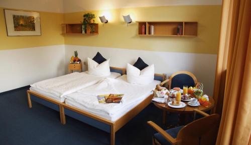 Imagen de la habitación del Hotel Regenbogenhaus. Foto 7