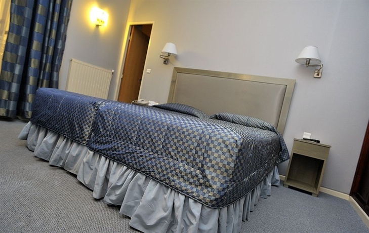 Imagen de la habitación del Hotel Regence Paris. Foto 4