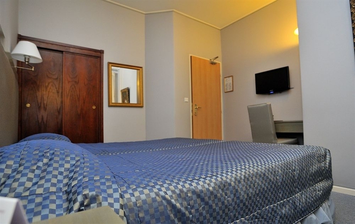 Imagen de la habitación del Hotel Regence Paris. Foto 5