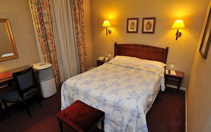 Imagen de la habitación del Hotel Regence Paris. Foto 6