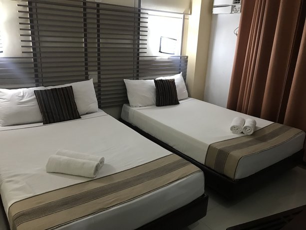 Imagen de la habitación del Hotel Regency De Vigan. Foto 6