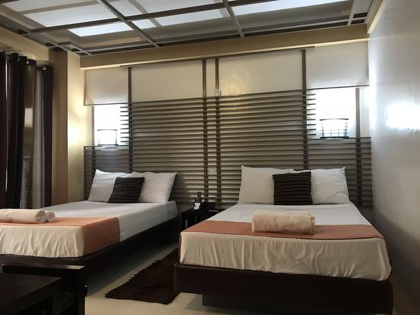 Imagen de la habitación del Hotel Regency De Vigan. Foto 11