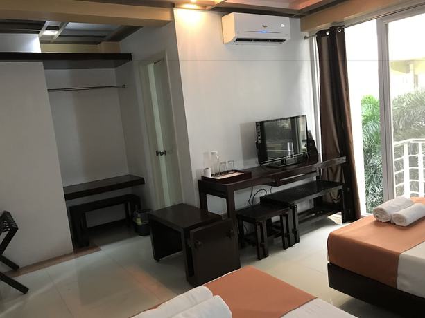 Imagen de la habitación del Hotel Regency De Vigan. Foto 12