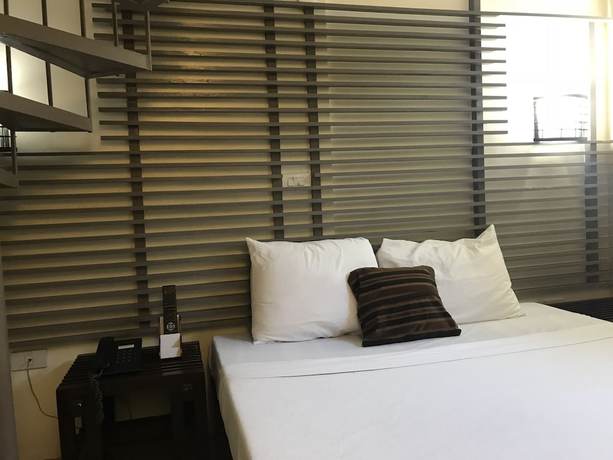 Imagen de la habitación del Hotel Regency De Vigan. Foto 16