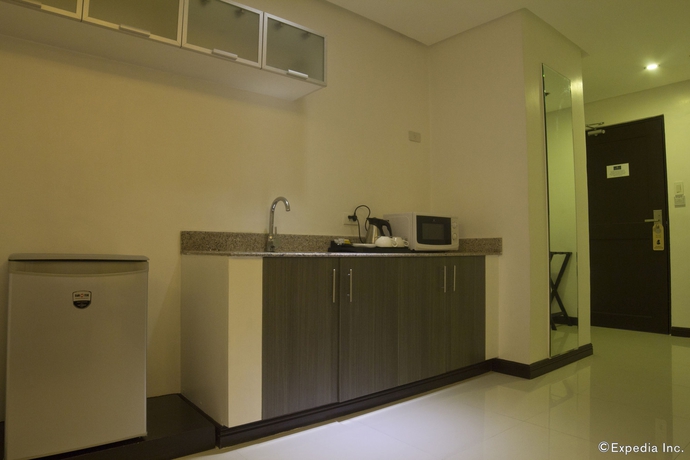 Imagen de la habitación del Hotel Regency Grand Suites. Foto 4