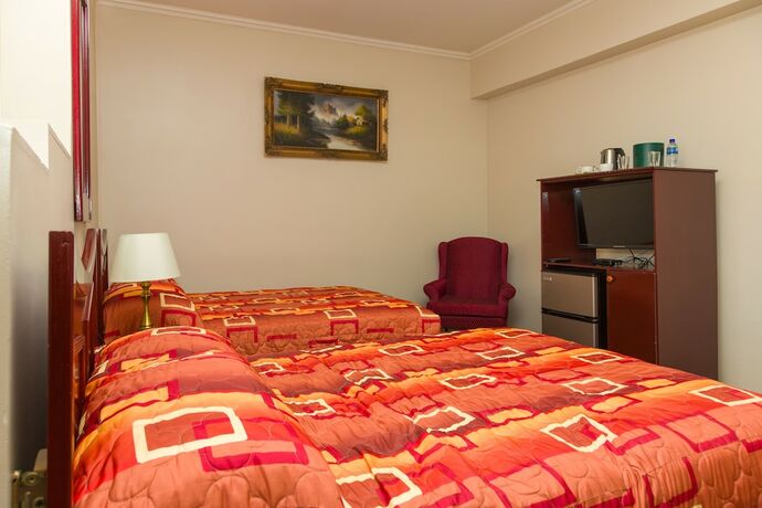 Imagen de la habitación del Hotel Regency Suites. Foto 19