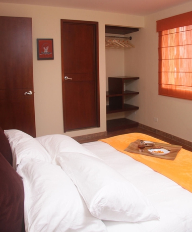 Imagen de la habitación del Hotel Regency Suites La Feria. Foto 7