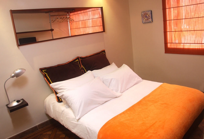 Imagen de la habitación del Hotel Regency Suites La Feria. Foto 9