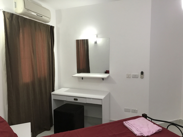 Imagen de la habitación del Hotel Regency Towers Apartments. Foto 8