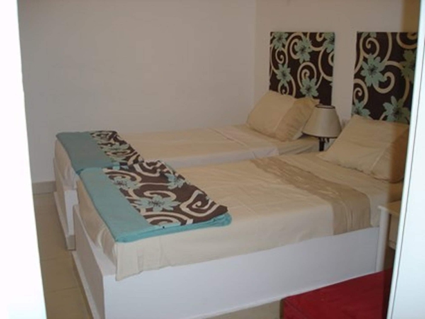 Imagen de la habitación del Hotel Regency Towers Apartments. Foto 11