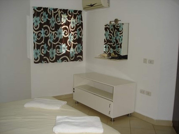 Imagen de la habitación del Hotel Regency Towers Apartments. Foto 14