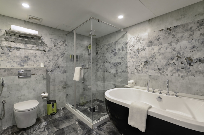 Imagen de la habitación del Hotel Regenta Central Antarim Ahmedabad. Foto 4