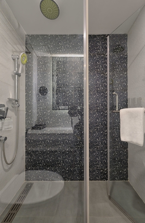 Imagen de la habitación del Hotel Regenta Central Antarim Ahmedabad. Foto 11