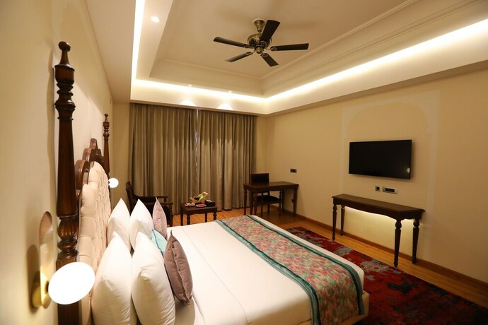 Imagen de la habitación del Hotel Regenta Central City Vilas Palace Ambala. Foto 23