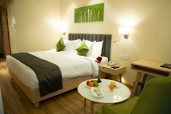 Imagen de la habitación del Hotel Regenta Central Harsha Vapi. Foto 3