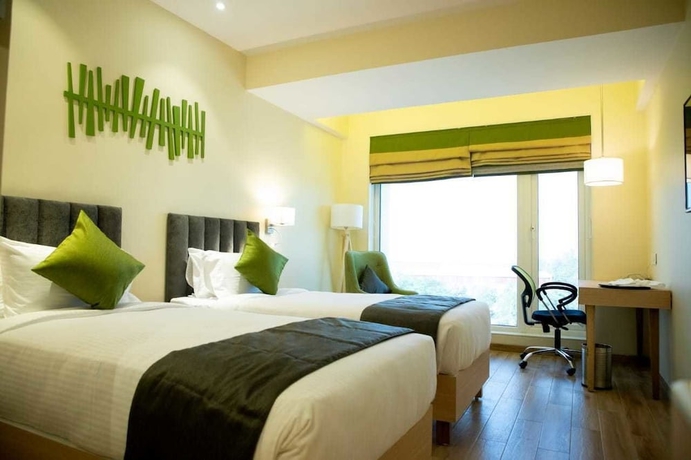 Imagen de la habitación del Hotel Regenta Central Harsha Vapi. Foto 4