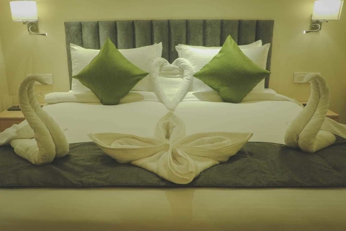 Imagen de la habitación del Hotel Regenta Central Harsha Vapi. Foto 6