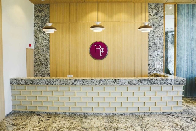 Imagen de los interiores del Hotel Regenta Central Harsha Vapi. Foto 19