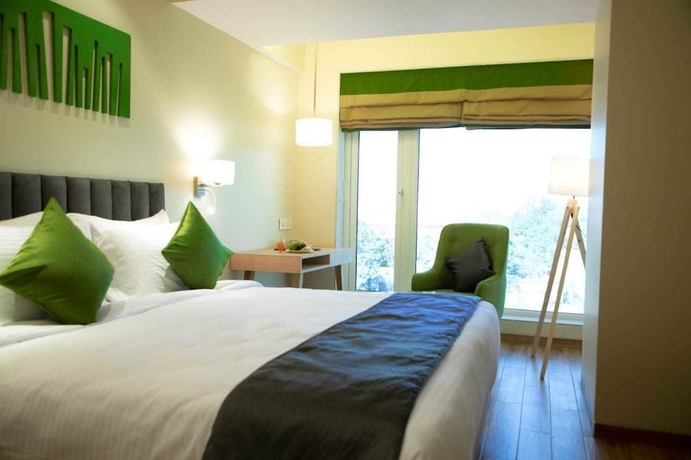 Imagen de la habitación del Hotel Regenta Central Harsha Vapi. Foto 9