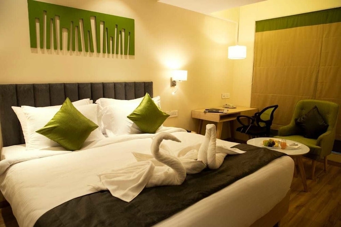 Imagen de la habitación del Hotel Regenta Central Harsha Vapi. Foto 11