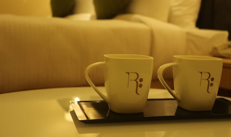 Imagen de la habitación del Hotel Regenta Central Harsha Vapi. Foto 15