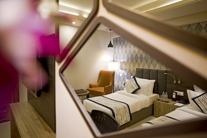 Imagen de la habitación del Hotel Regenta Central Noida. Foto 8