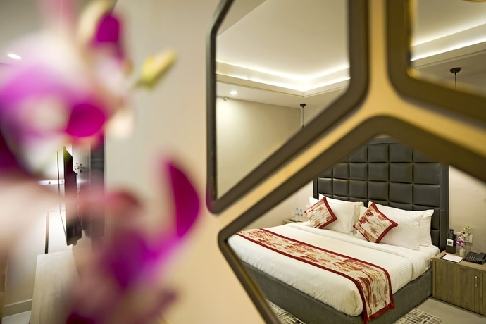 Imagen de la habitación del Hotel Regenta Central Noida. Foto 11