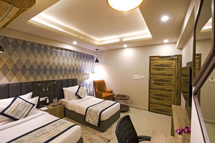 Imagen de la habitación del Hotel Regenta Central Noida. Foto 13