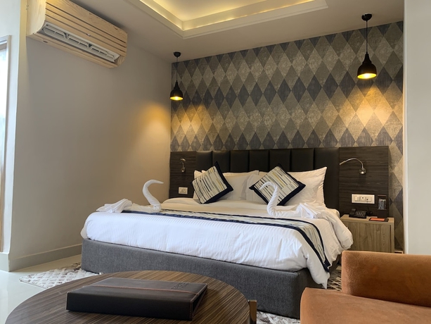 Imagen de la habitación del Hotel Regenta Central Noida. Foto 14