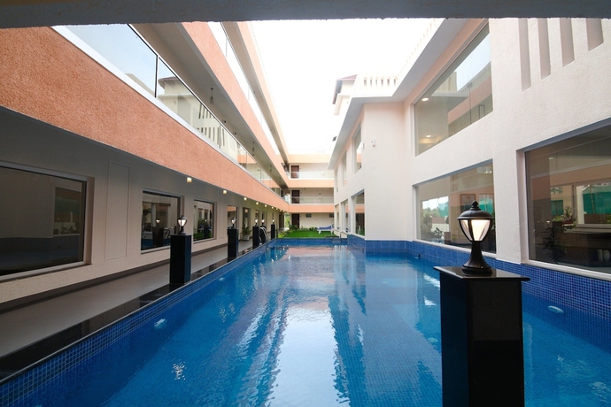 Imagen de la piscina del Hotel Regenta Central North Goa. Foto 19