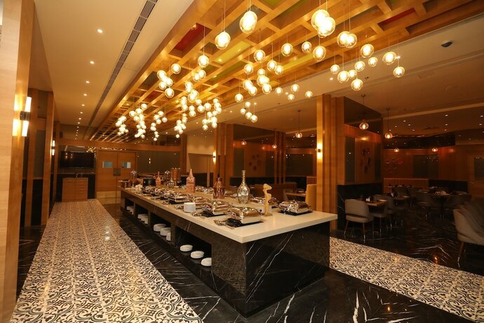 Imagen del bar/restaurante del Hotel Regenta Central Udaipur. Foto 7