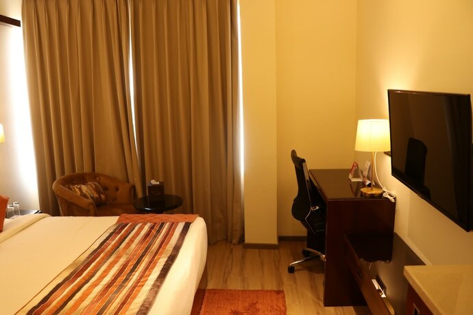 Imagen de la habitación del Hotel Regenta Inn Amritsar Airport Road. Foto 16