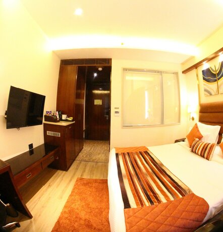 Imagen de la habitación del Hotel Regenta Inn Amritsar Airport Road. Foto 17
