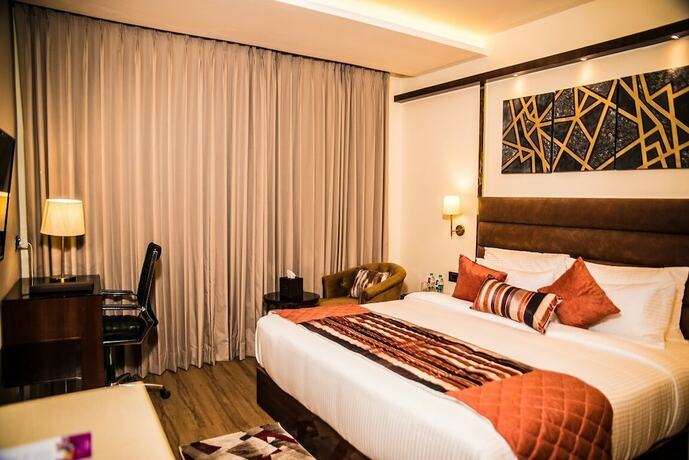 Imagen de la habitación del Hotel Regenta Inn Amritsar Airport Road. Foto 18