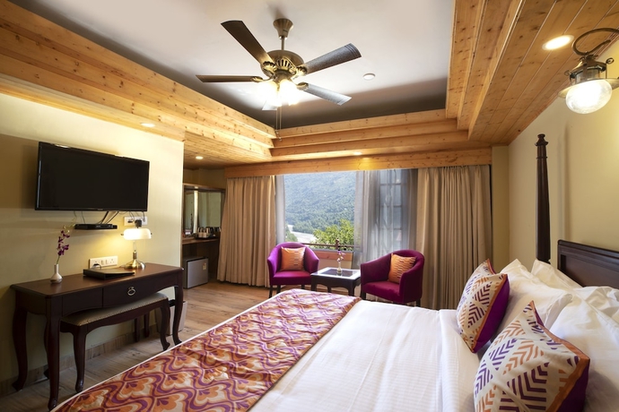 Imagen de la habitación del Hotel Regenta Inn By Riverside Manali. Foto 2