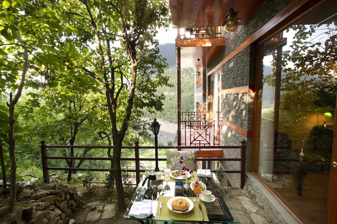 Imagen de la habitación del Hotel Regenta Inn By Riverside Manali. Foto 8