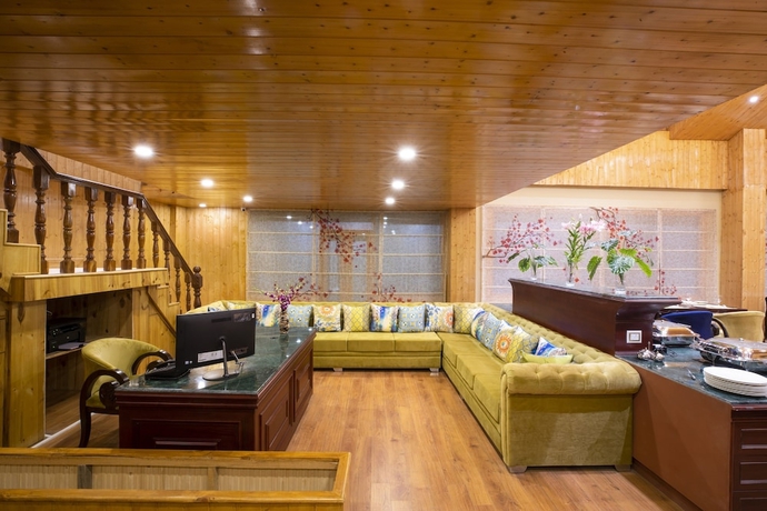 Imagen de los interiores del Hotel Regenta Inn By Riverside Manali. Foto 18