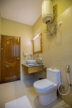 Imagen de la habitación del Hotel Regenta Inn By Riverside Manali. Foto 15
