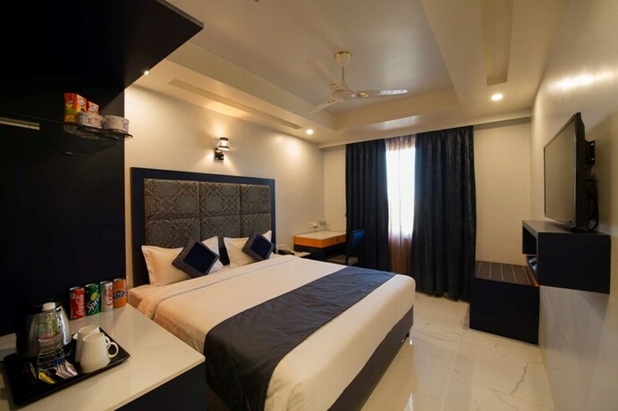 Imagen de la habitación del Hotel Regenta Inn. Foto 16