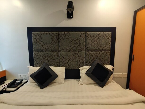 Imagen de la habitación del Hotel Regenta Inn. Foto 20