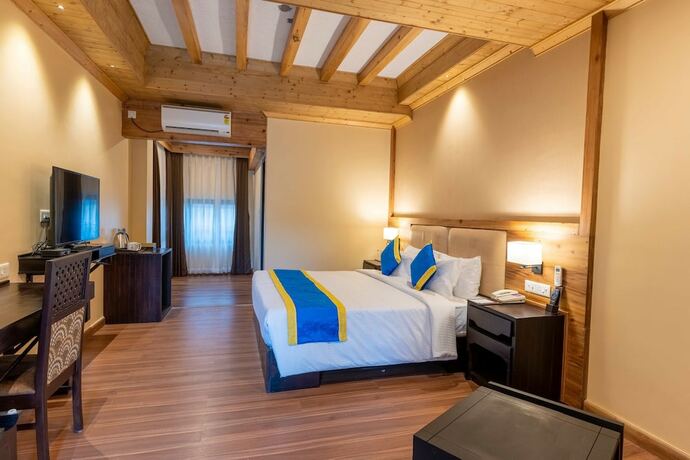 Imagen de la habitación del Hotel Regenta Inn Gangtok. Foto 12