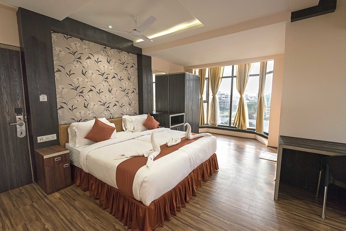 Imagen de la habitación del Hotel Regenta Inn Larica. Foto 8