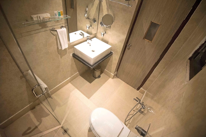 Imagen de la habitación del Hotel Regenta Inn Larica. Foto 9