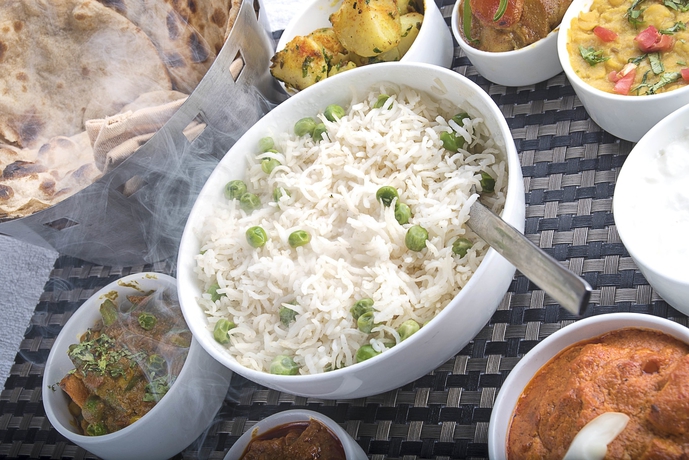 Imagen del bar/restaurante del Hotel Regenta Inn Larica. Foto 4