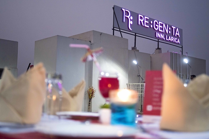 Imagen del bar/restaurante del Hotel Regenta Inn Larica. Foto 6